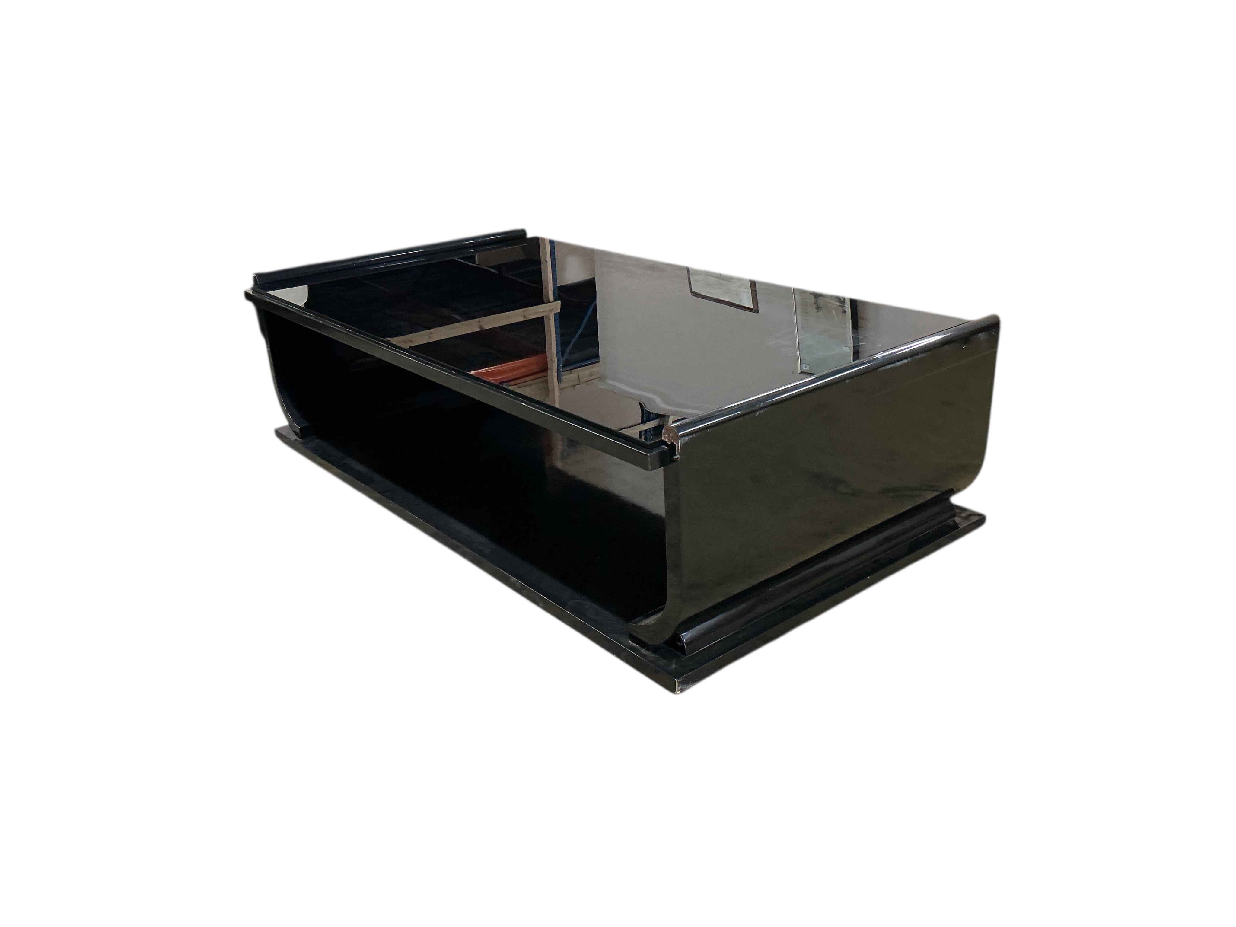 A Contemporary rectangular ebonized glass top coffee table, width 180cm, depth 102cm, height 51cm